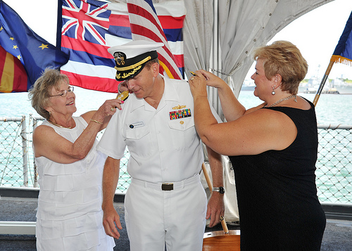 A Captain promoted to Rear Admiral in a ceremony